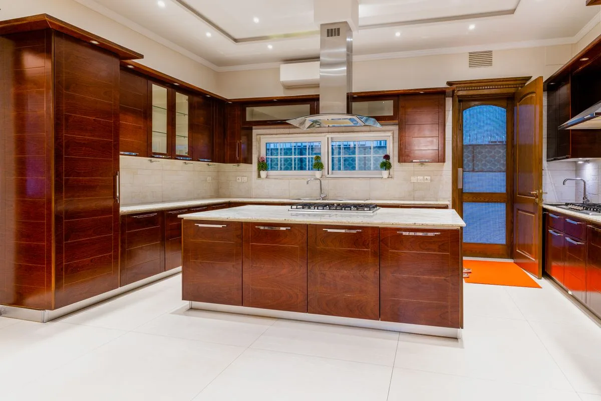 Premium modern kitchen showroom with stainless steel appliances — Michael Lamidis Limassol